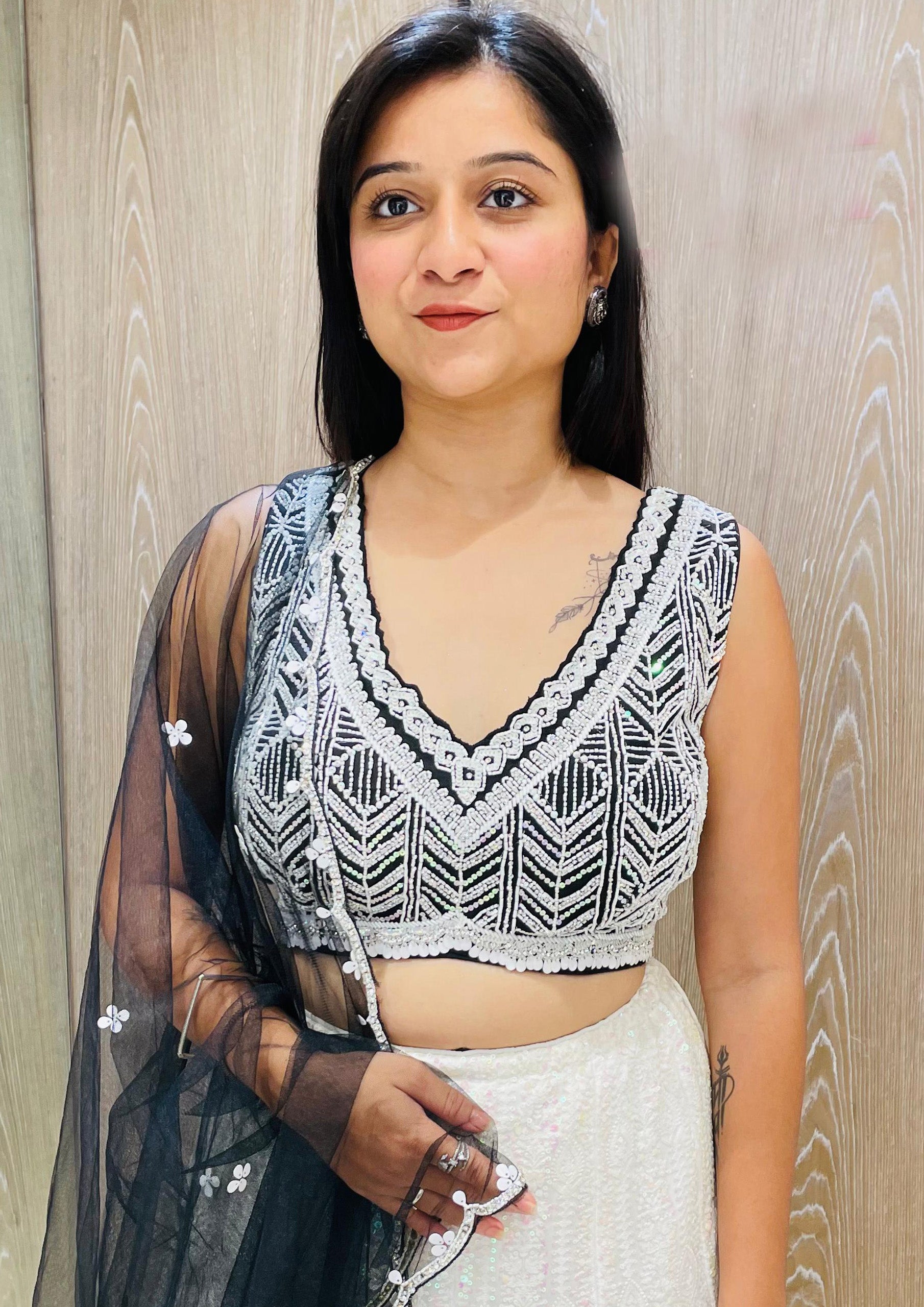 Off White And Black Color Georgette Sequins Work Lehenga Choli